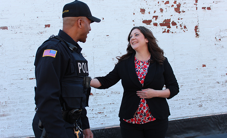 Beth Salmo talking to a friend officer